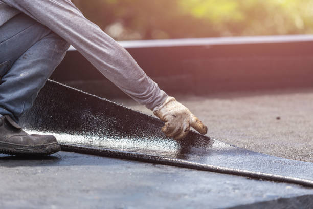Professional Waterproofing technician working in Lewis, IN